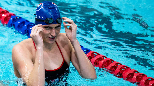 Penn swimmer Lia Thomas in the pool during an collegiate swim meet.